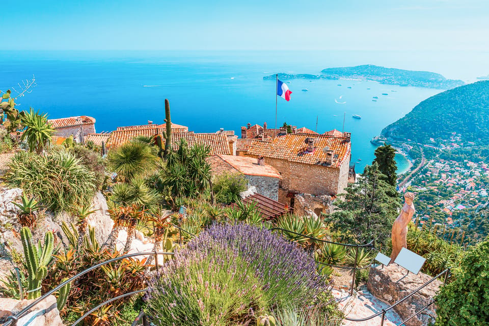 From Nice: Eze, Monaco, and Monte Carlo Half-Day Trip - Monaco Old Town and the Grand Prix track course: fast sights, guided direction