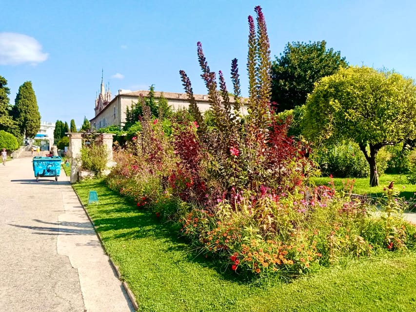 Nice: 7 Hills Monastery & Waterfall (EBike Tour Local Guide) - Promenade des Anglais finale: grand hotels, wide boulevard, and a perfect ride’s end