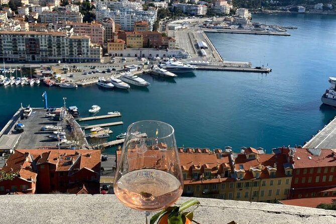 Nice Walking Tour with Wine Tasting - Promenade des Anglais: English winters, palm silhouettes, and sea air