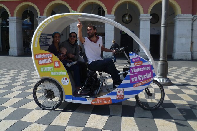 Private tour guide of Nice in electric taxibikes - The Old Town alleys: rue de la Préfecture, rue Droite, and church landmarks